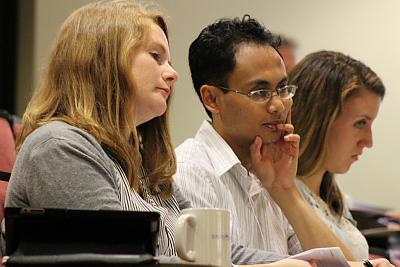 Participants listen to presentation at Landmark College